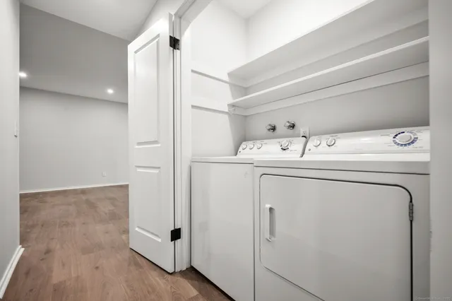 a utility room with dryer and washer