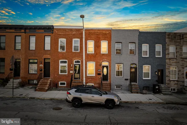 a car parked in front of a building