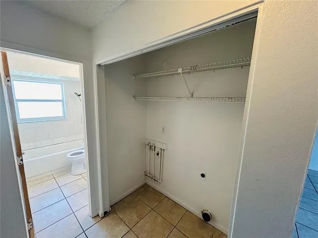a view of an empty walk in closet