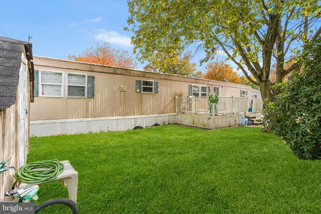 a backyard of a house with seating space