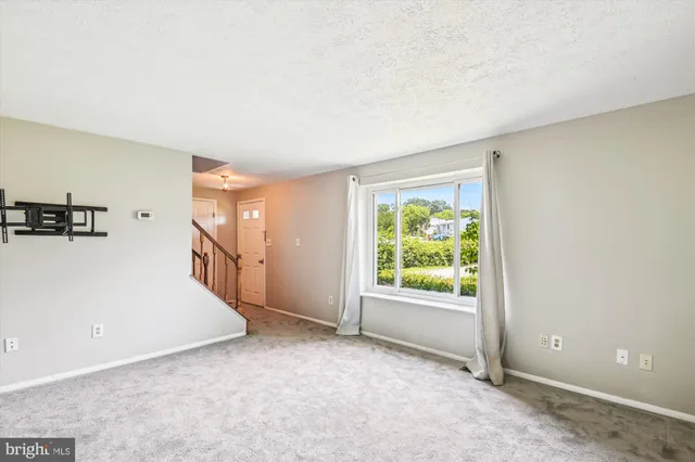 an empty room with a natural light