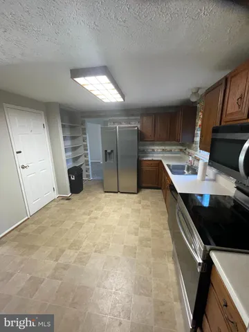 a view of hallway with a large window
