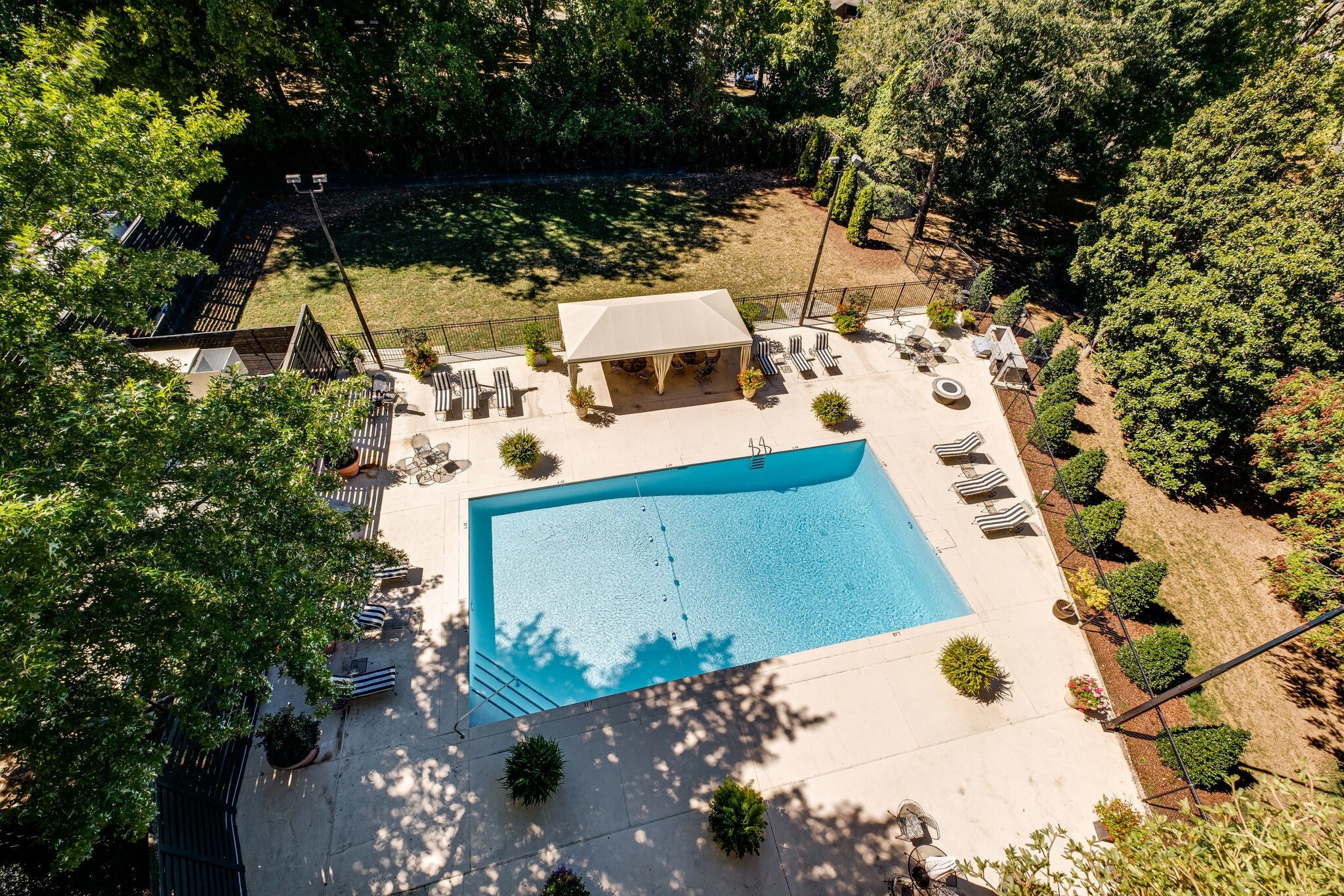 4215 Harding Pike, Unit 203 Nashville, TN 37205 - Photo 7 of 8 an aerial view of a house with a yard