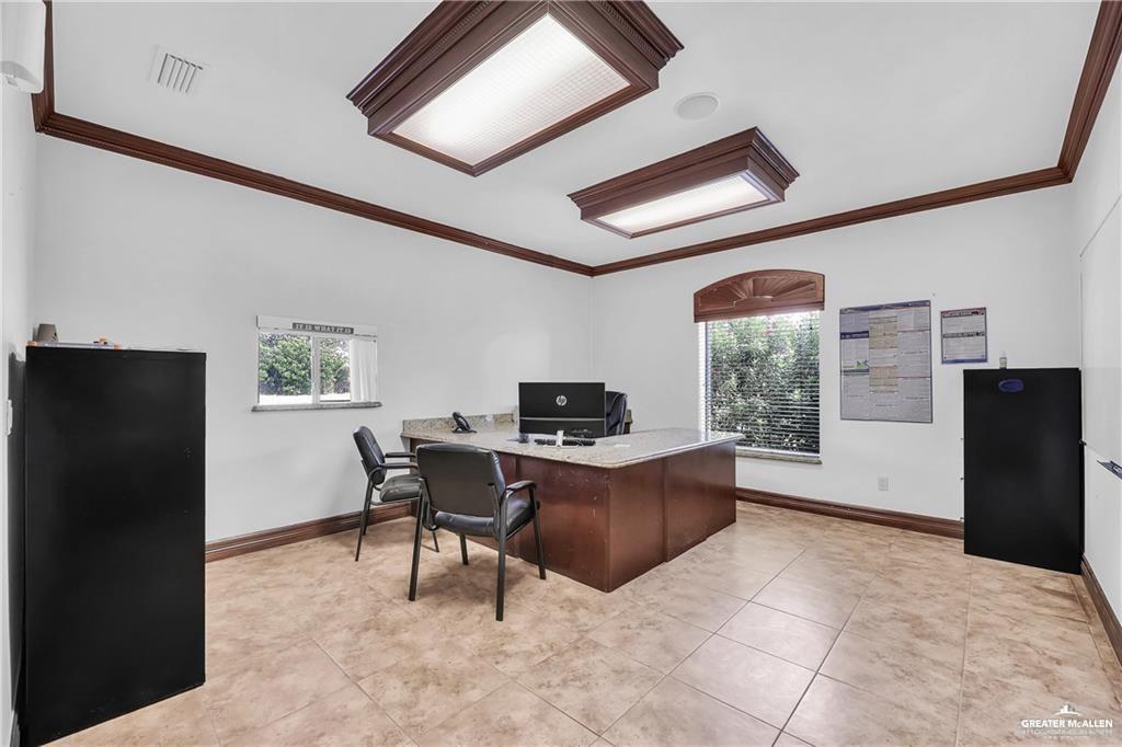 3105 West Expy 83 Palmview, TX 78572 - Photo 5 of 6 a living room with furniture and a large window
