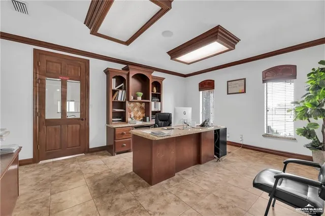 a view of kitchen with kitchen island dining table and chairs