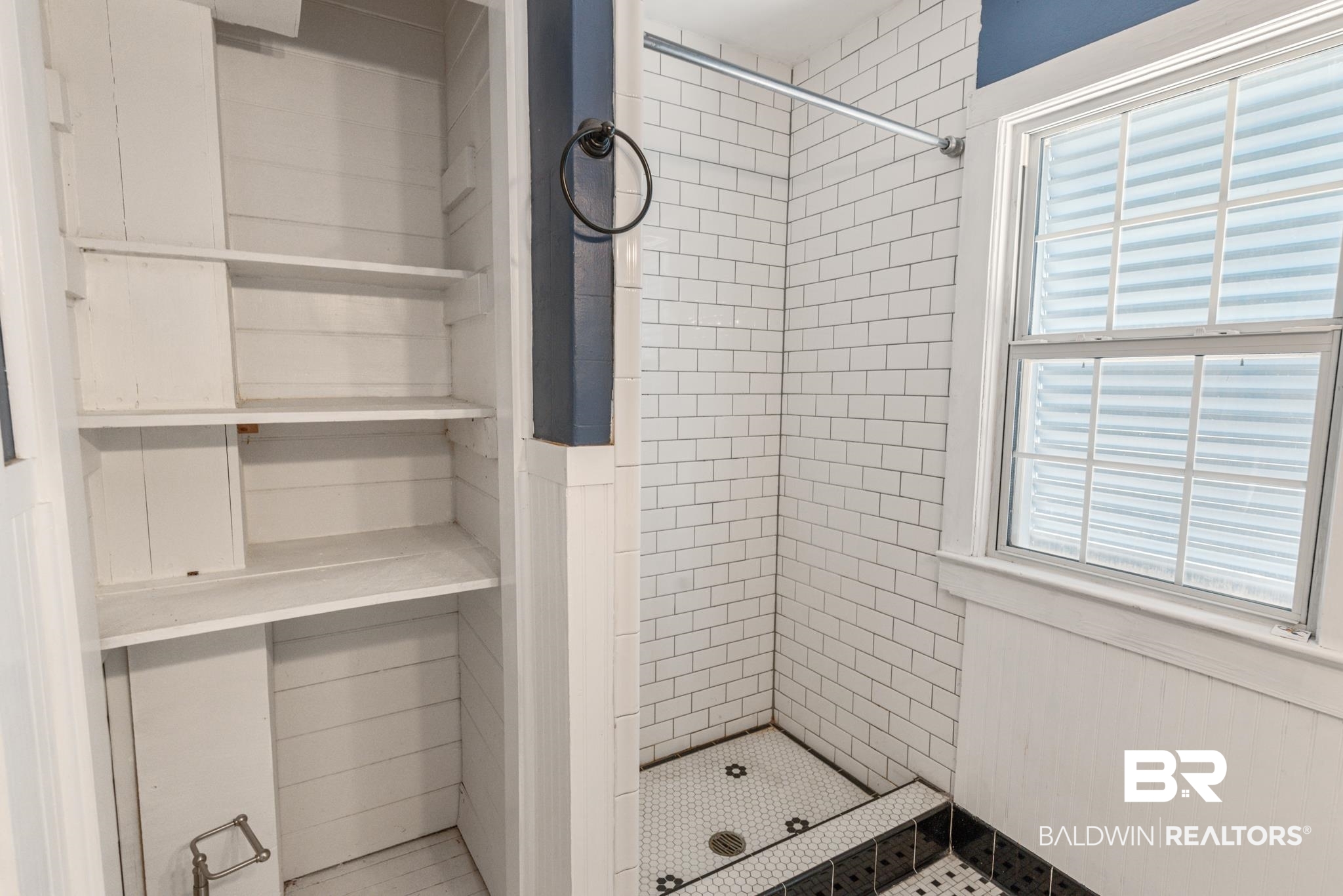 114 Crenshaw Street Mobile, AL 36606 - Photo 33 of 49 Bathroom featuring tiled shower and tile patterned floors