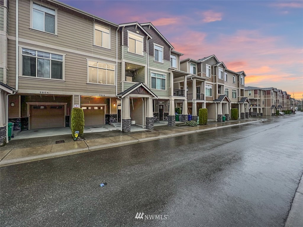 3808 Northeast 3rd Place Renton, WA 98056 - Photo 1 of 34 a front view of a building with street view