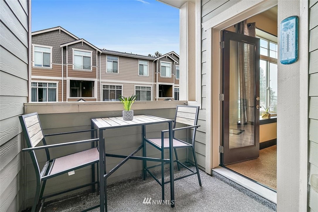 3808 Northeast 3rd Place Renton, WA 98056 - Photo 19 of 34 a view of a balcony with chairs