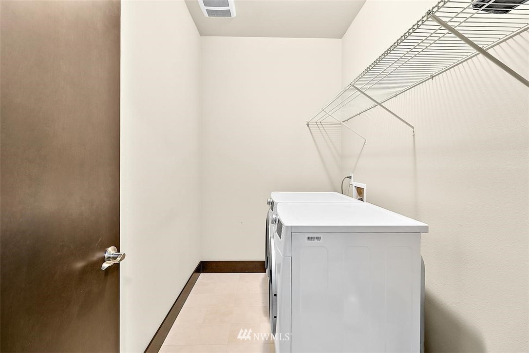 3808 Northeast 3rd Place Renton, WA 98056 - Photo 24 of 34 a utility room with dryer and washer