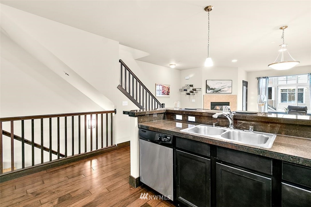 3808 Northeast 3rd Place Renton, WA 98056 - Photo 5 of 34 a kitchen with a sink and stove