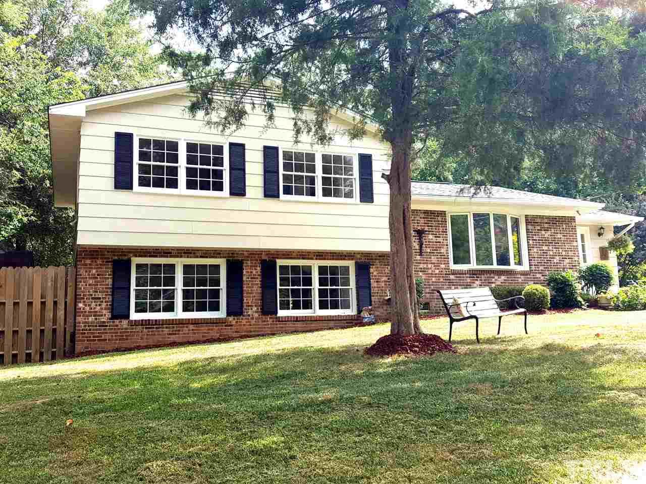 400 Compton Road Raleigh, NC 27609 - Photo 1 of 25 a house view with a seating space and garden
