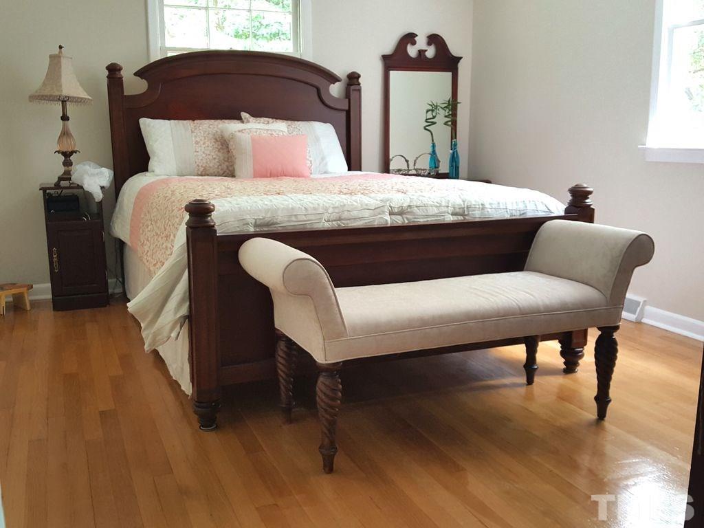 400 Compton Road Raleigh, NC 27609 - Photo 12 of 25 a bedroom with a bed and a table