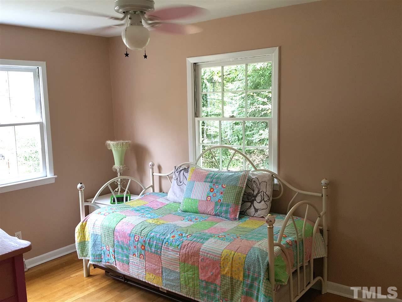 400 Compton Road Raleigh, NC 27609 - Photo 13 of 25 a bedroom with a bed and window