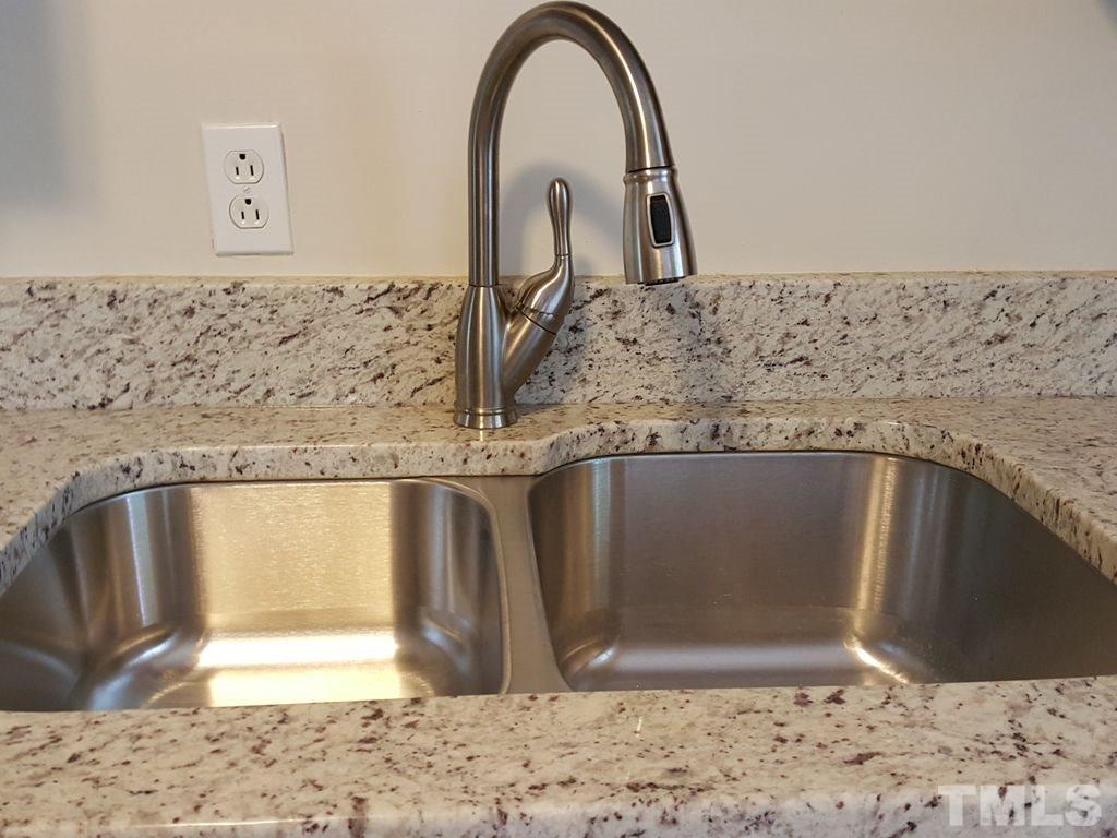 400 Compton Road Raleigh, NC 27609 - Photo 6 of 25 a close view of sink and tap