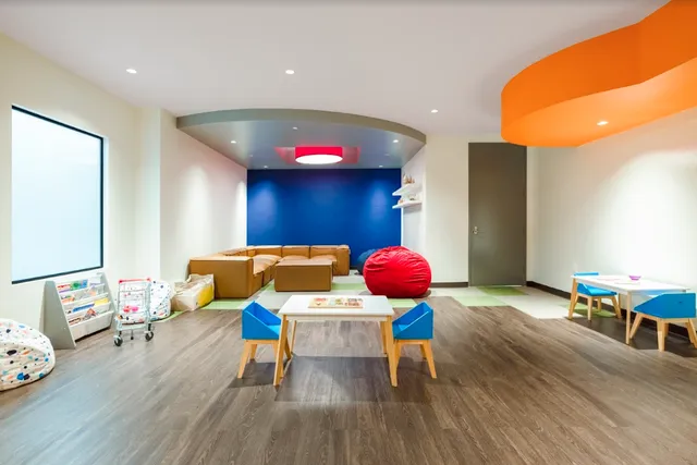 a picture of a bench in a white building