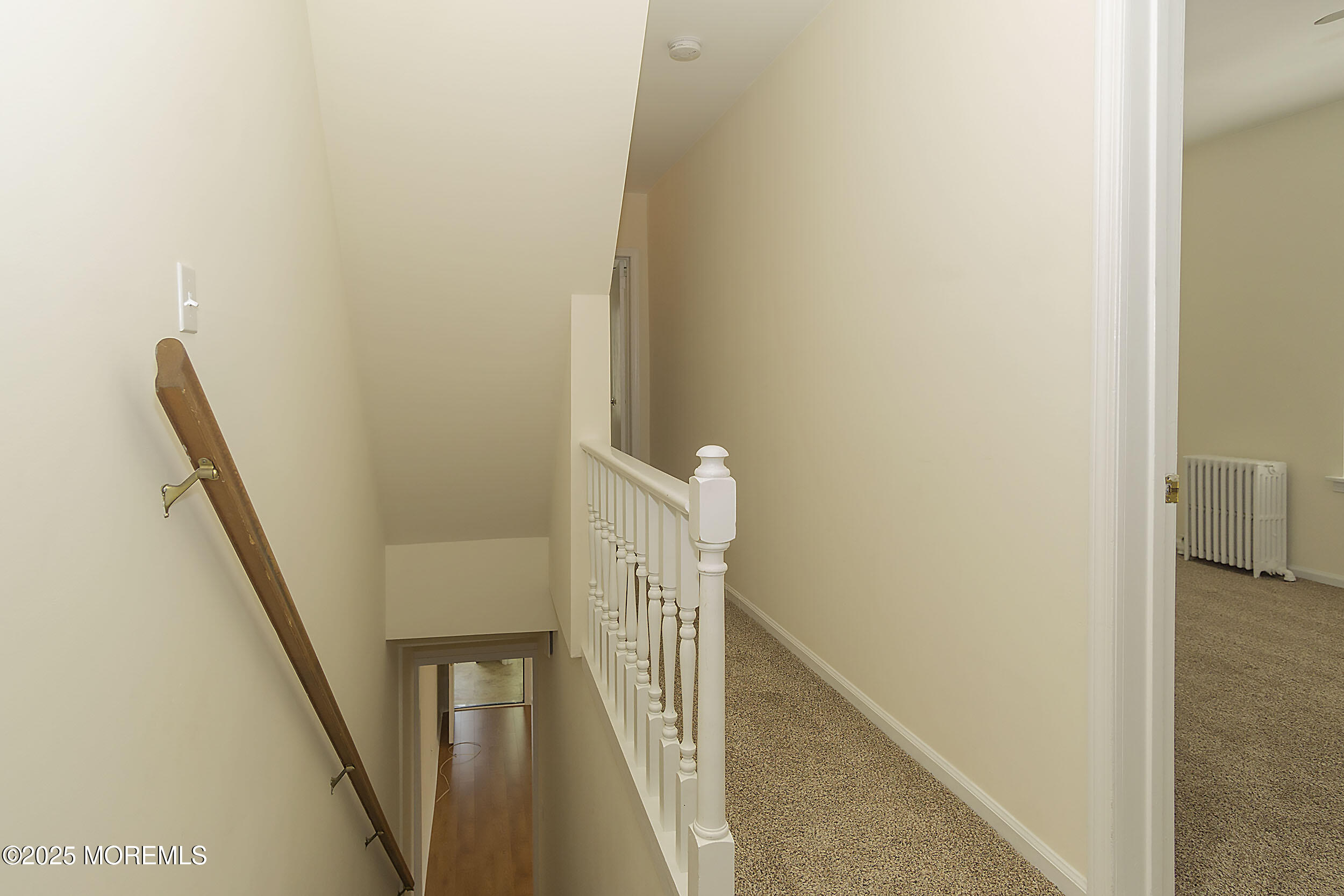 34 Bridge Avenue, Unit A Red Bank, NJ 07701 - Photo 18 of 27 a view of a hallway with staircase