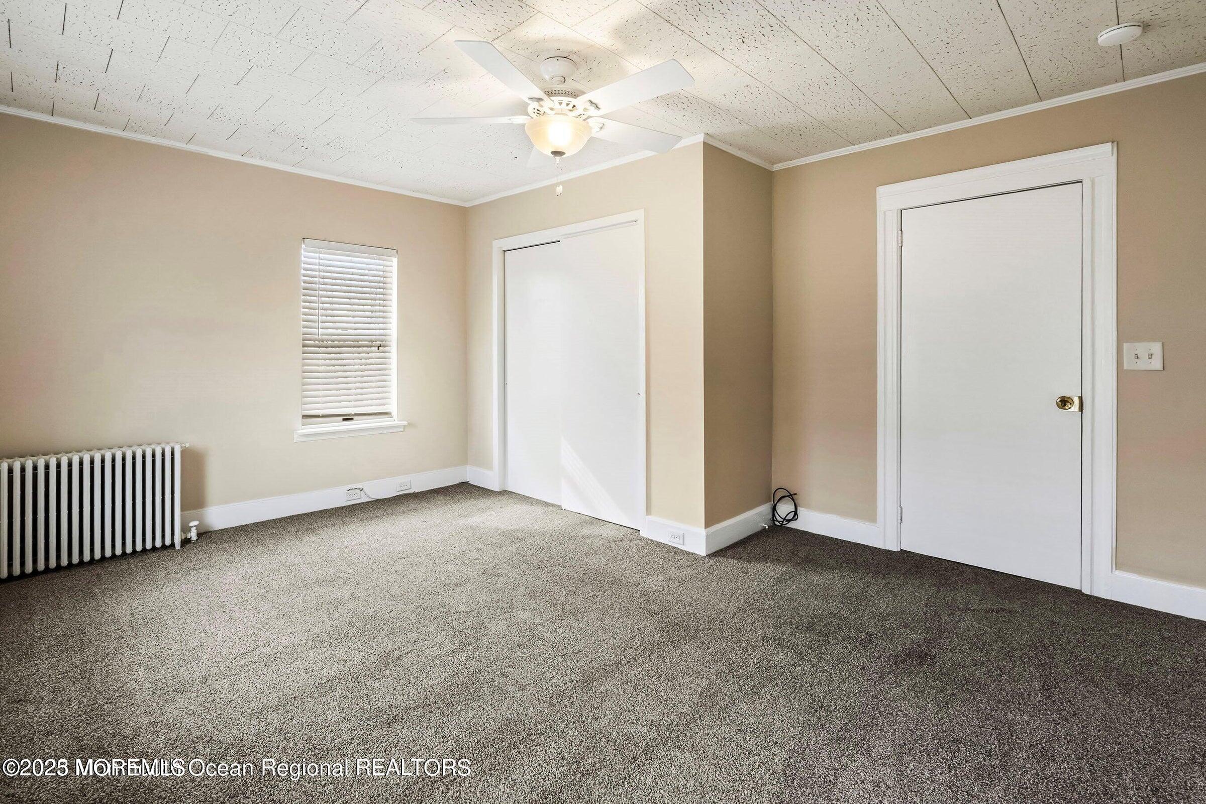 34 Bridge Avenue, Unit A Red Bank, NJ 07701 - Photo 23 of 27 an empty room with windows