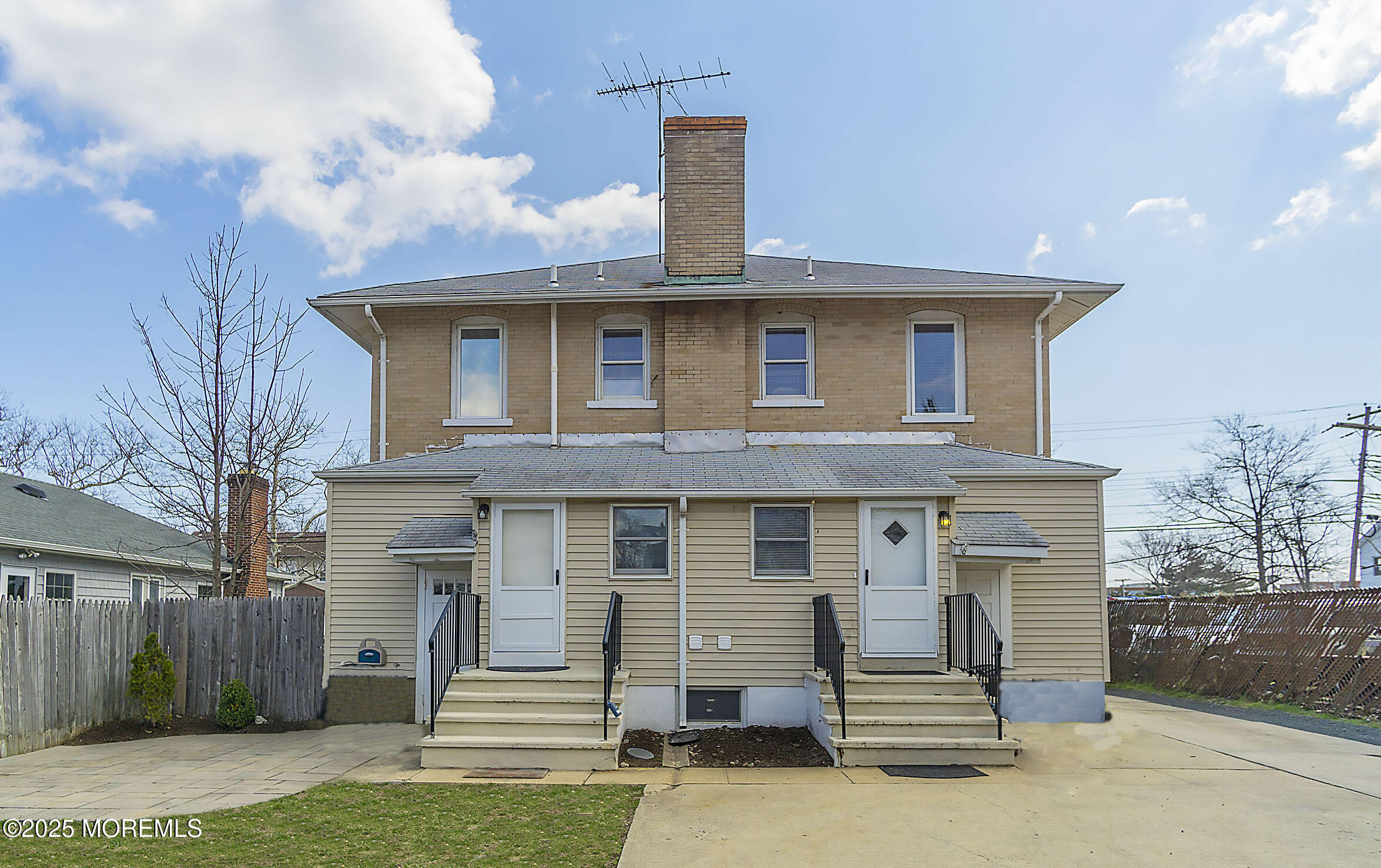 34 Bridge Avenue, Unit A Red Bank, NJ 07701 - Photo 24 of 27 a front view of a house with a garden