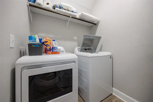 a view of houses with yard