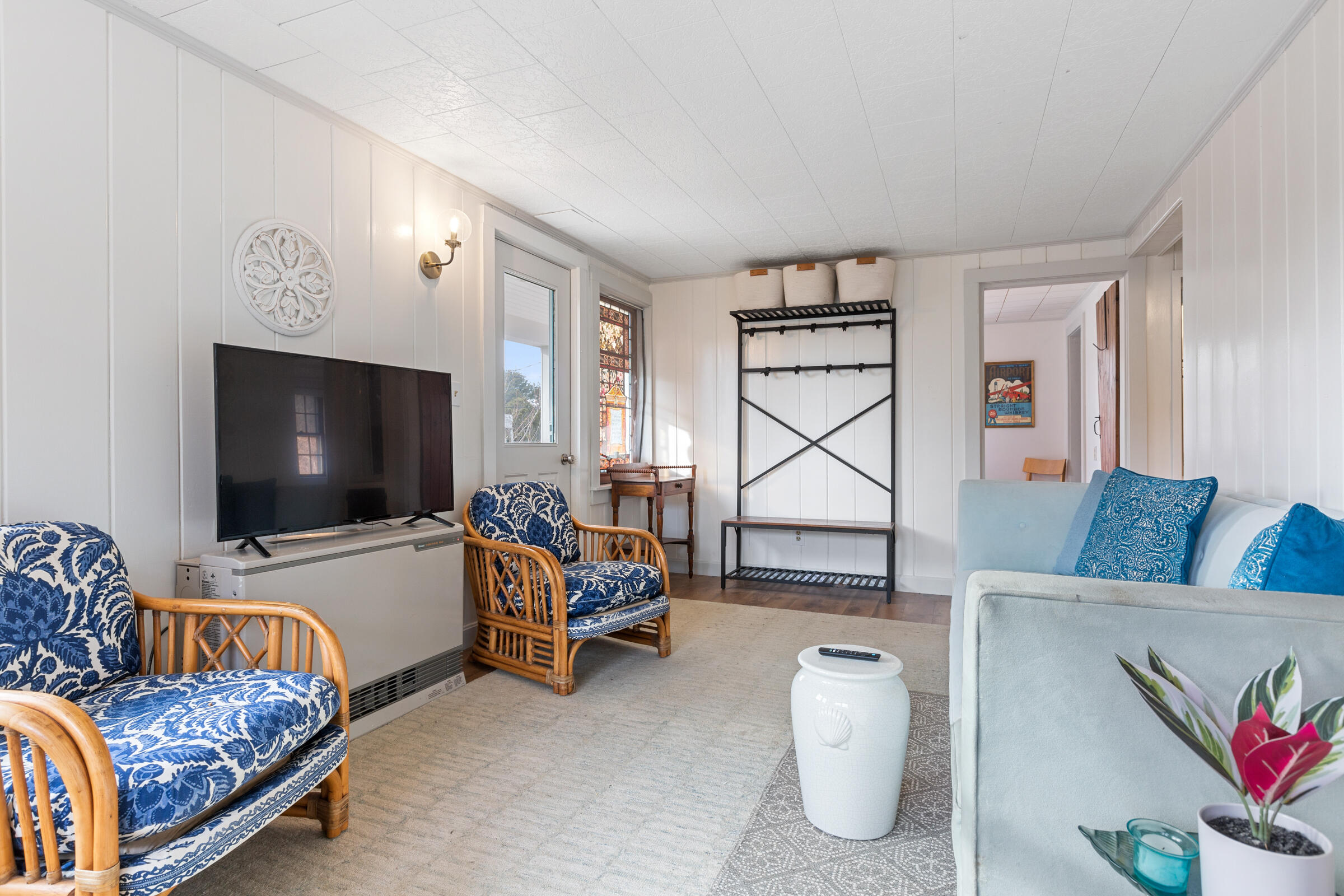 4 Perry Road Truro, MA 02666 - Photo 13 of 29 a living room with furniture and a flat screen tv