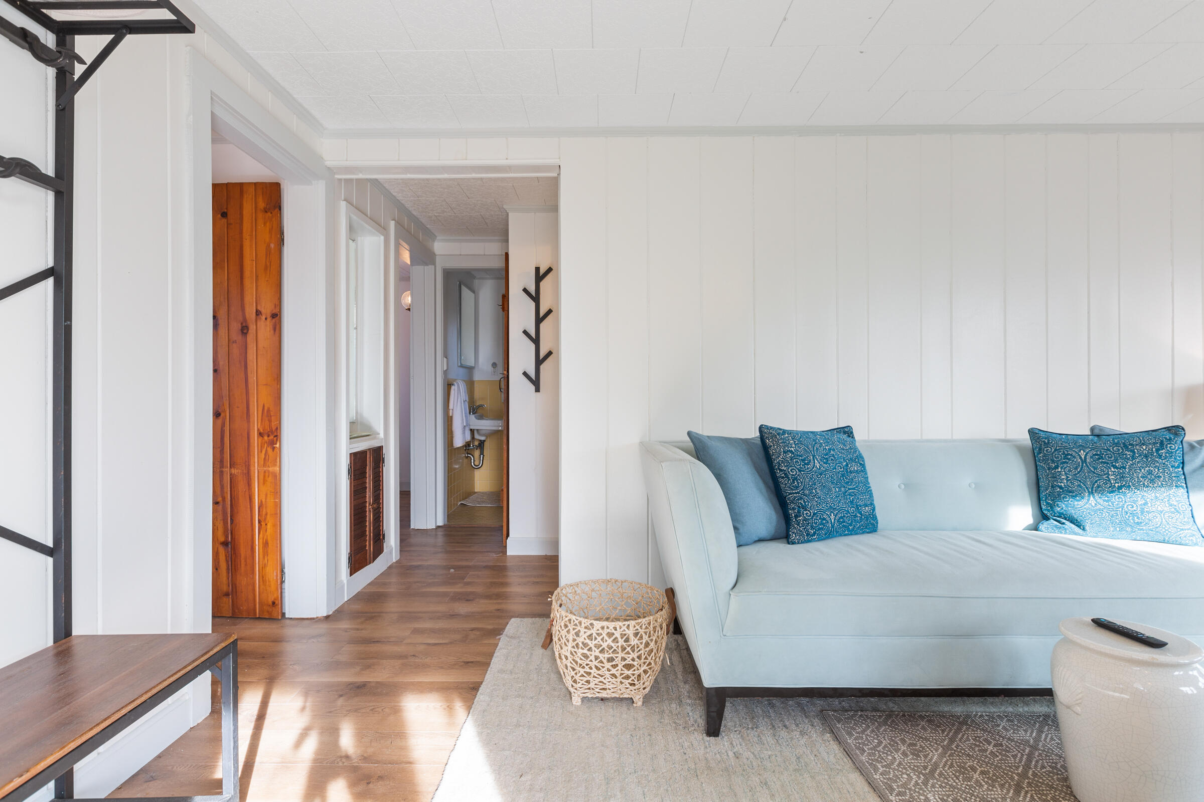 4 Perry Road Truro, MA 02666 - Photo 14 of 29 a living room with furniture and a wooden floor