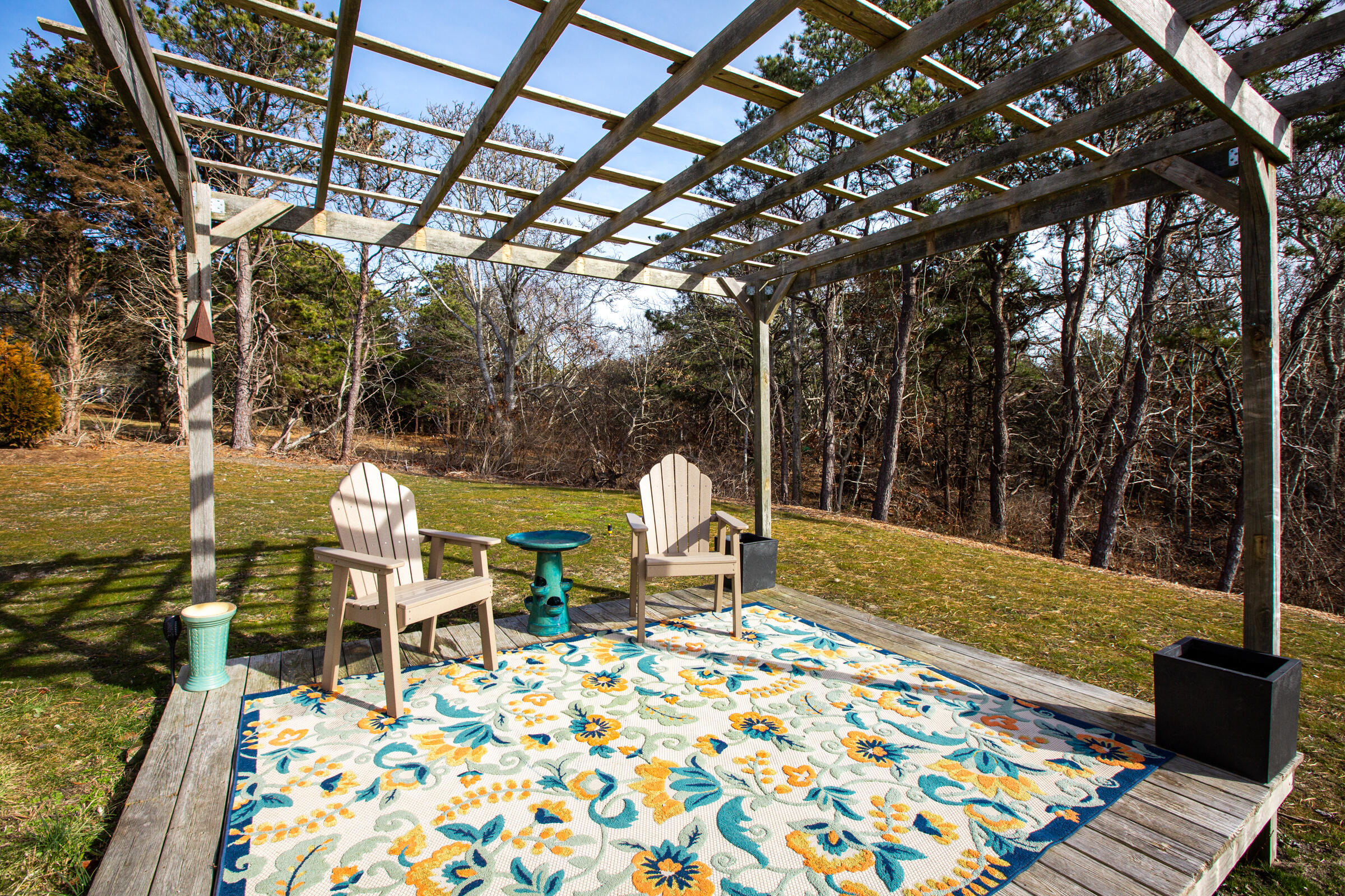 4 Perry Road Truro, MA 02666 - Photo 25 of 29 a front view of a house with a yard