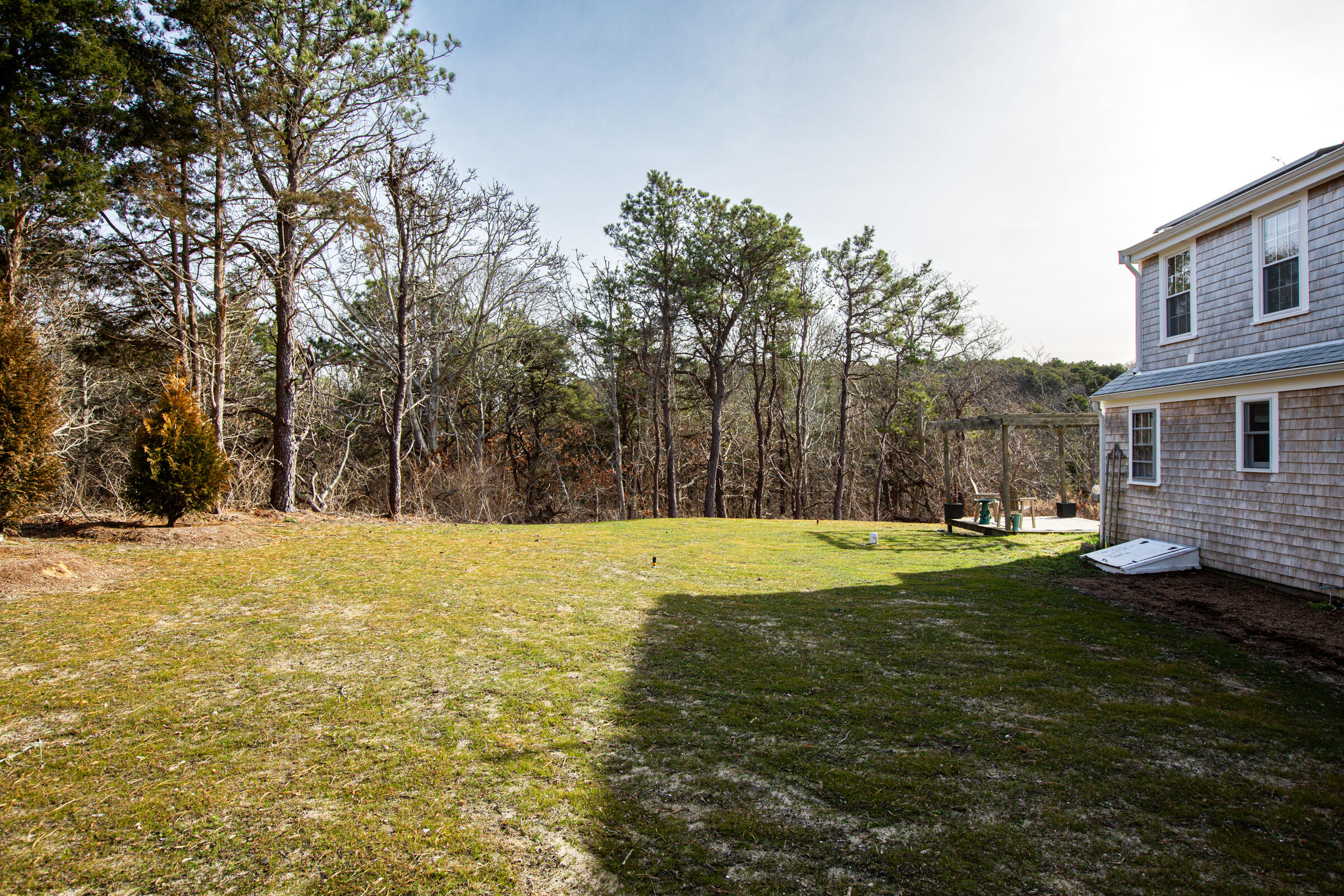 4 Perry Road Truro, MA 02666 - Photo 28 of 29 a swimming pool with wooden fence