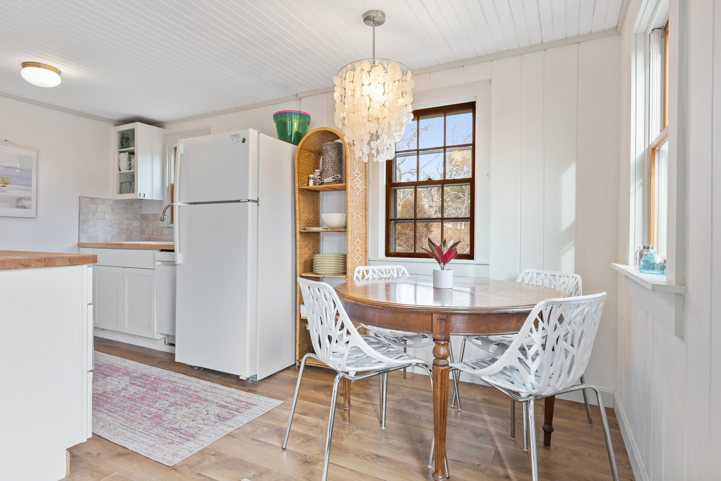 4 Perry Road Truro, MA 02666 - Photo 8 of 29 a view of a dining room with furniture and window