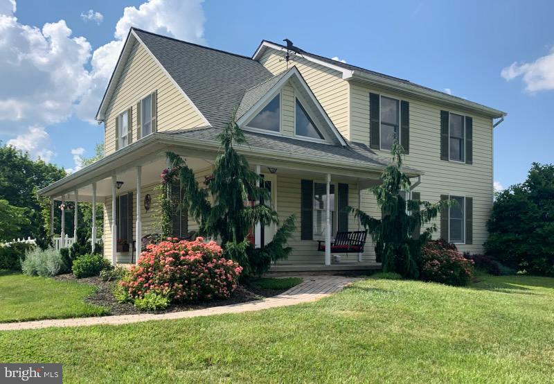 1150 Humbert Schoolhouse Road Westminster, MD 21158 - Photo 1 of 46 a front view of a house with garden
