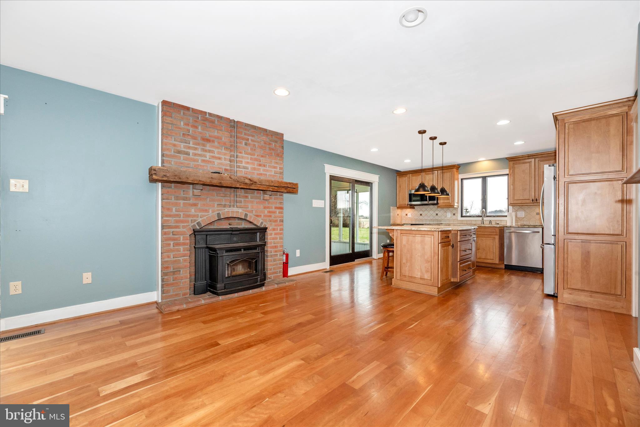 1150 Humbert Schoolhouse Road Westminster, MD 21158 - Photo 19 of 46 a view of a kitchen with furniture and a fireplace