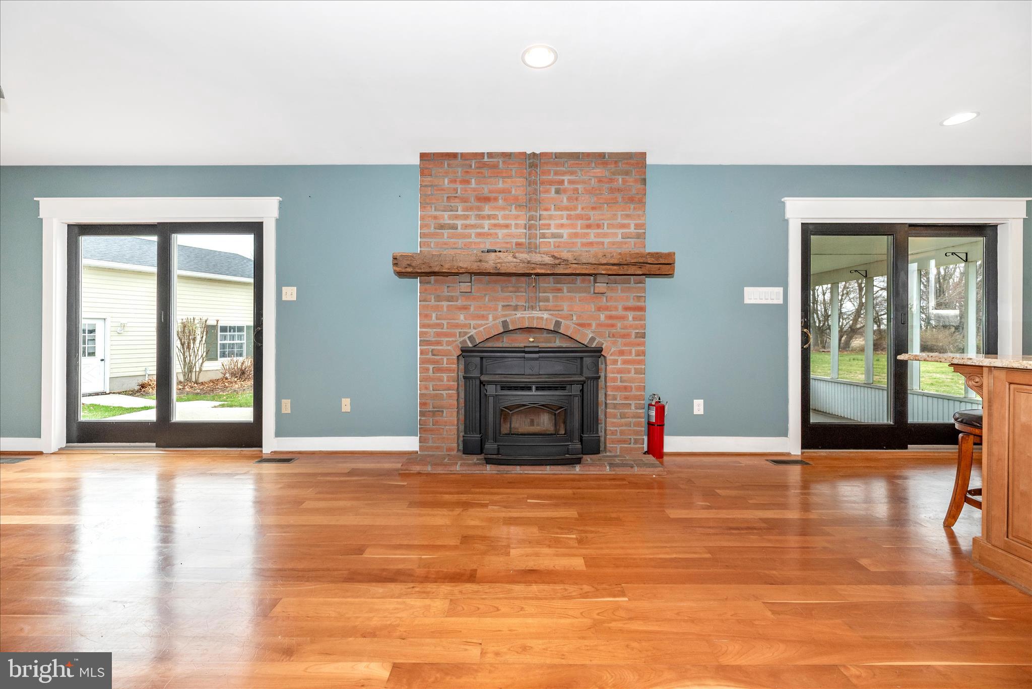 1150 Humbert Schoolhouse Road Westminster, MD 21158 - Photo 20 of 46 a view of empty room with floor to ceiling window and fireplace