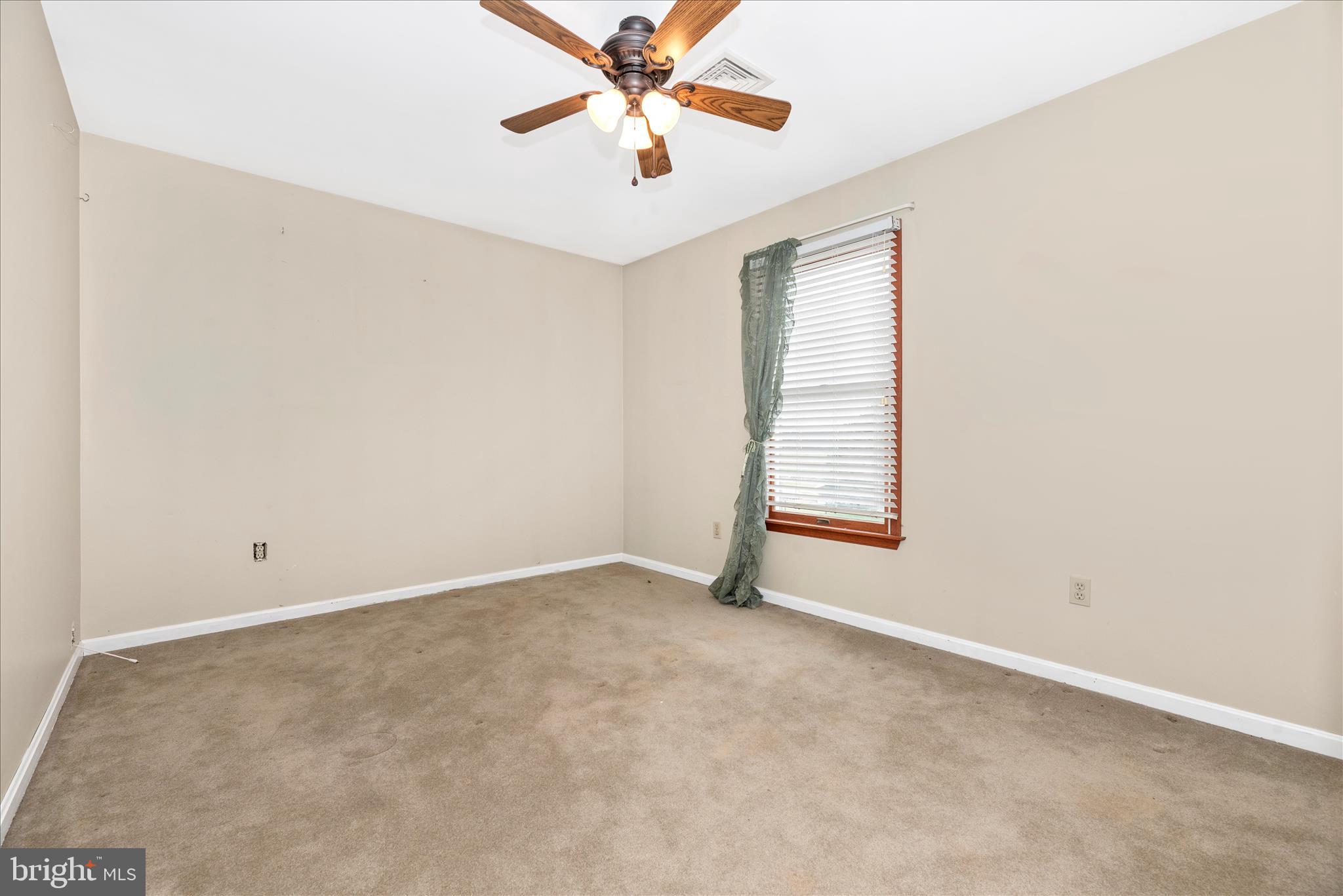 1150 Humbert Schoolhouse Road Westminster, MD 21158 - Photo 29 of 46 an empty room with windows and fan