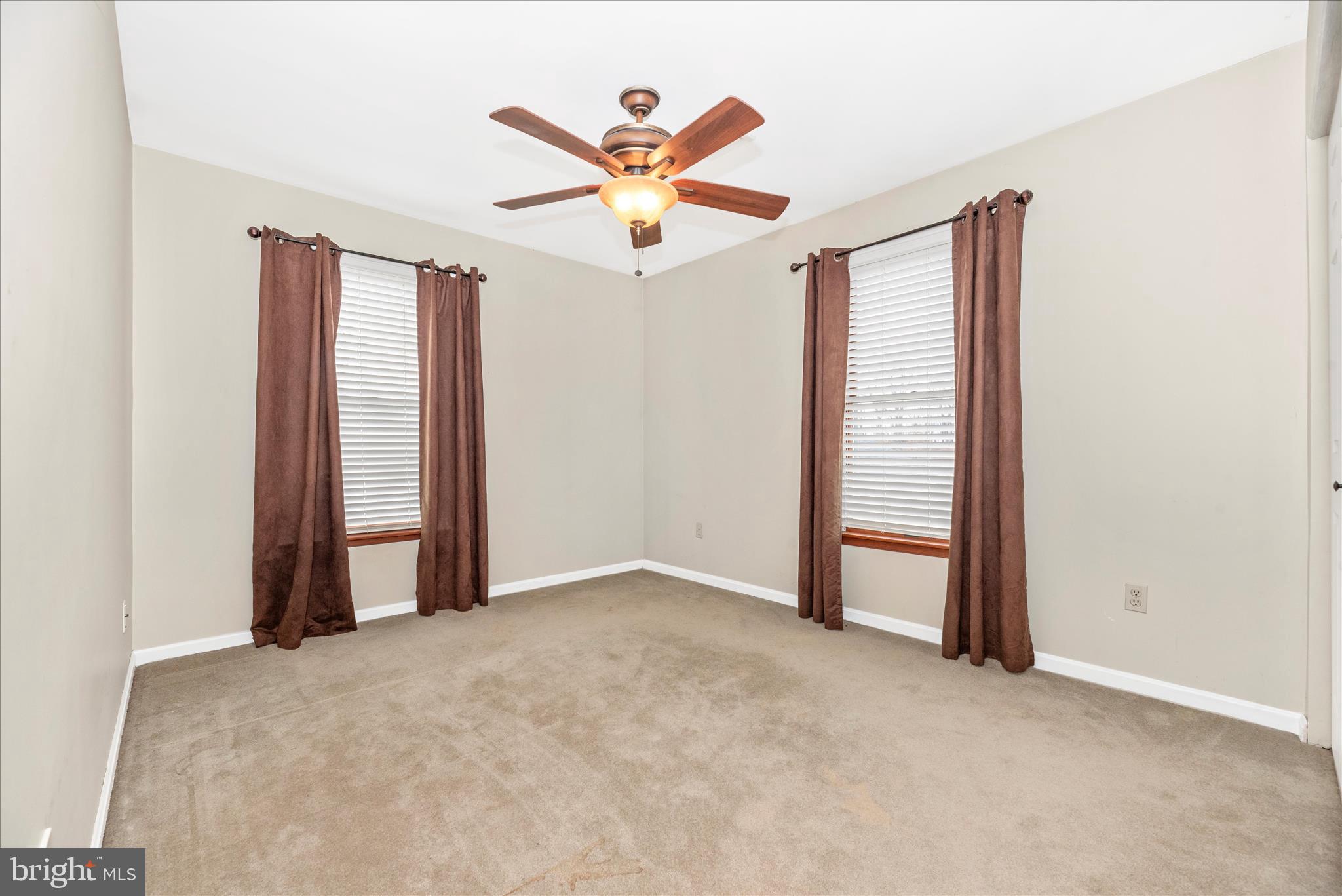 1150 Humbert Schoolhouse Road Westminster, MD 21158 - Photo 30 of 46 an empty room with closet and a ceiling fan