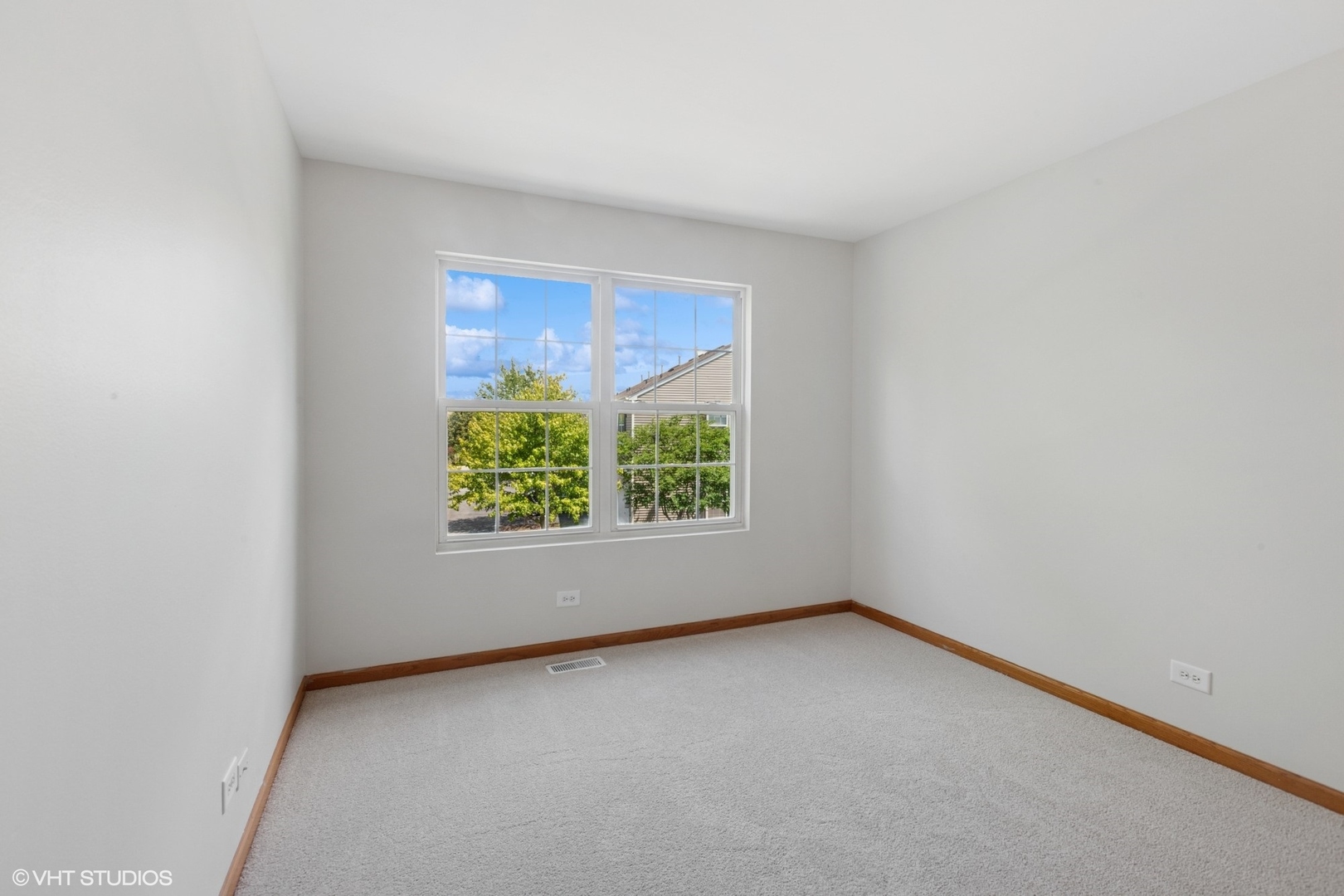 133 Springbrook Trail South Oswego, IL 60543 - Photo 22 of 29 an empty room with windows