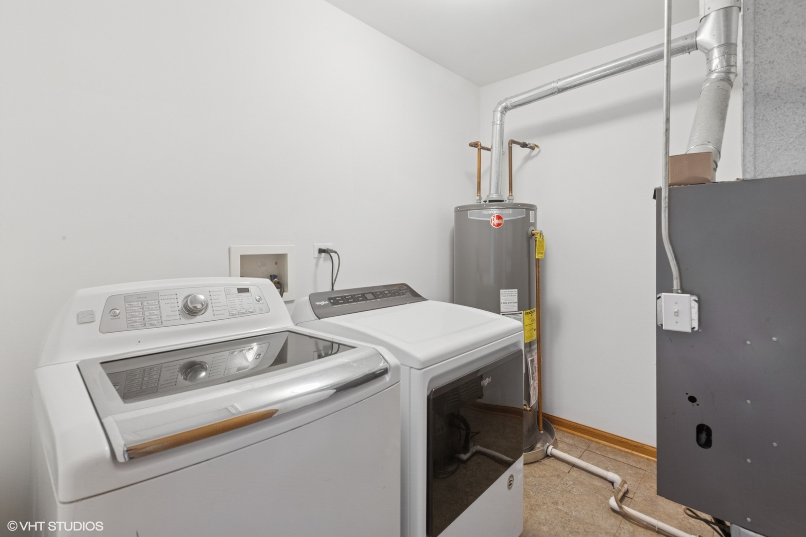 133 Springbrook Trail South Oswego, IL 60543 - Photo 24 of 29 a utility room with dryer and washer