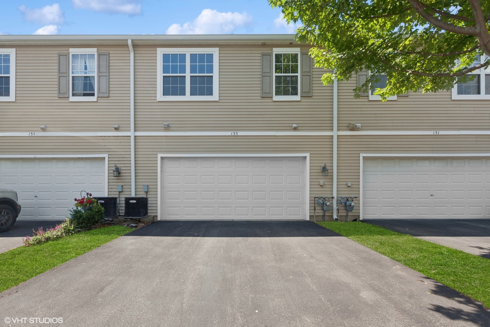 133 Springbrook Trail South Oswego, IL 60543 - Photo 26 of 29 a front view of house with yard and trees
