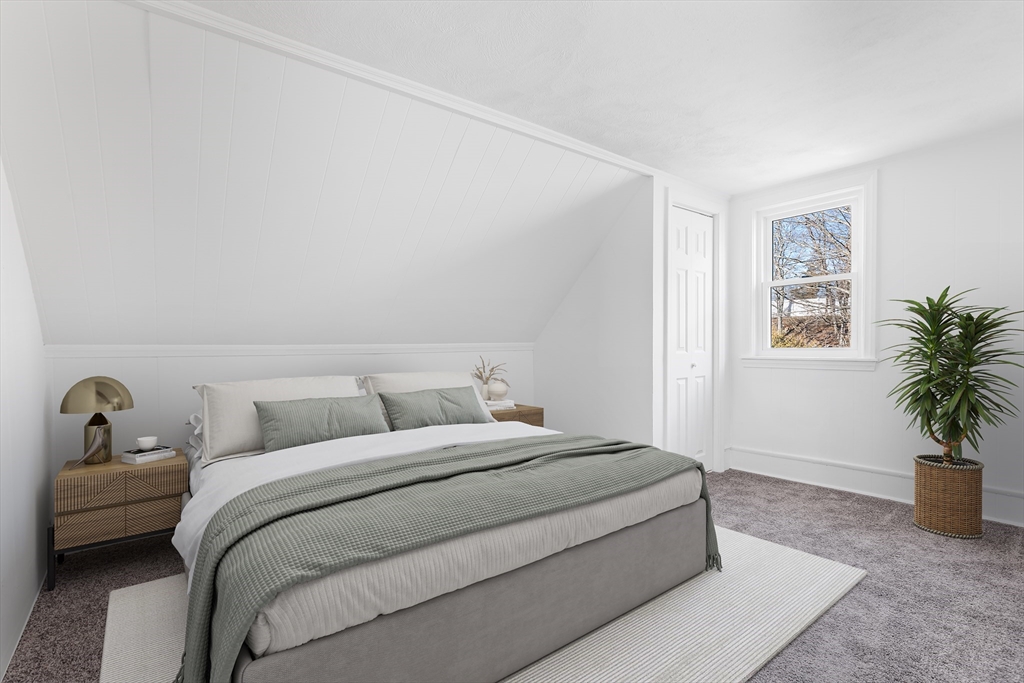 26 Pequit Street Canton, MA 02021 - Photo 5 of 8 a bedroom with a bed and a potted plant