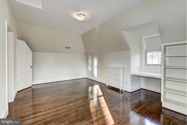 a view of a room with a small yard