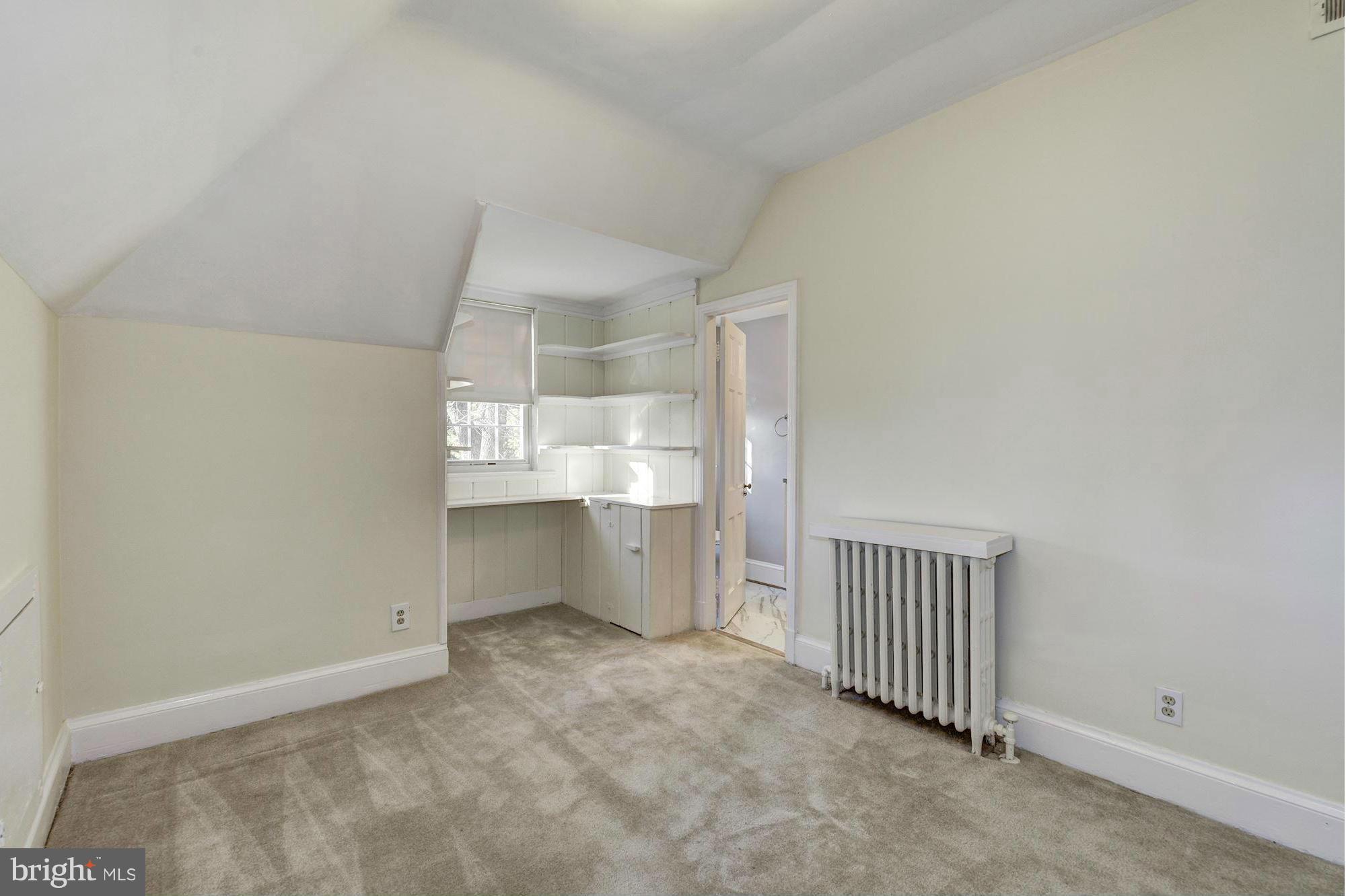 4910 Hillbrook Lane Northwest Washington, DC 20016 - Photo 23 of 30 a view of a room with a small yard