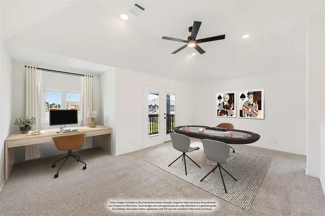 a work room with furniture and a window