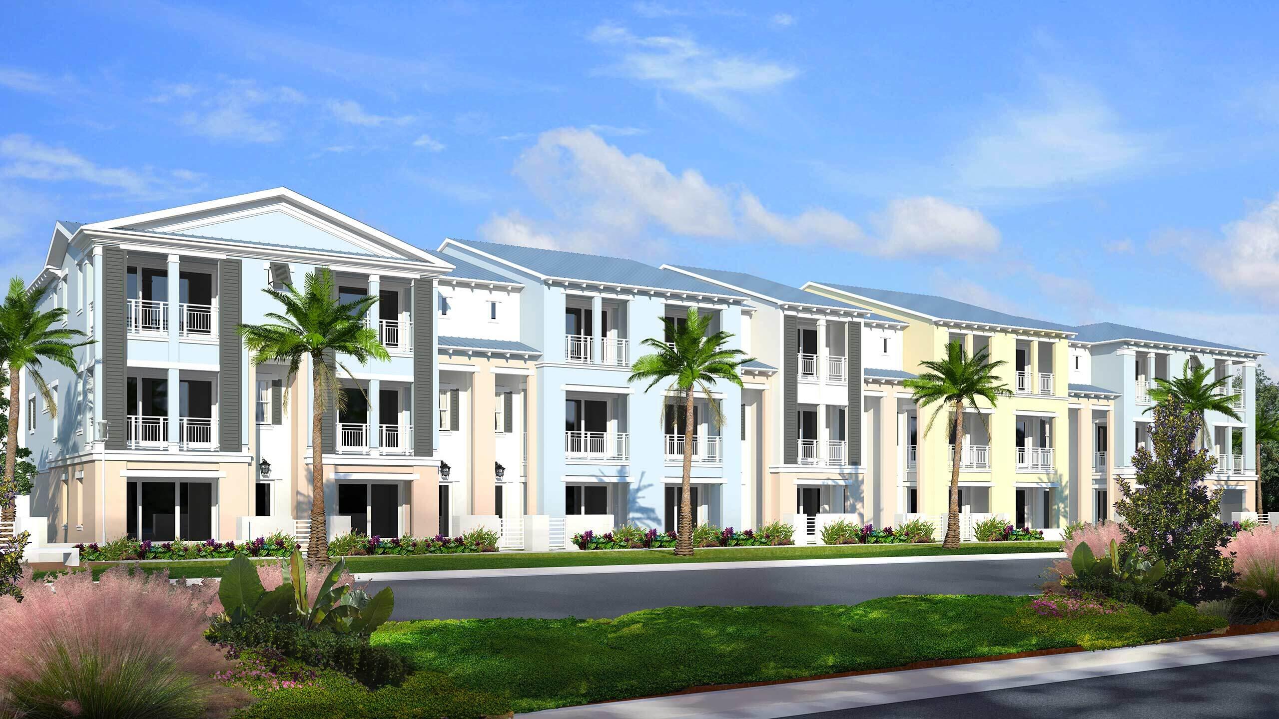 12681 Machiavelli Way Palm Beach Gardens, FL 33418 - Photo 1 of 40 a front view of a residential apartment building with a yard