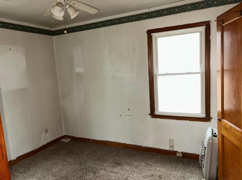 904 North Ball Road Memphis, TN 38106 - Photo 6 of 8 a view of a room that has a window and a ceiling fan