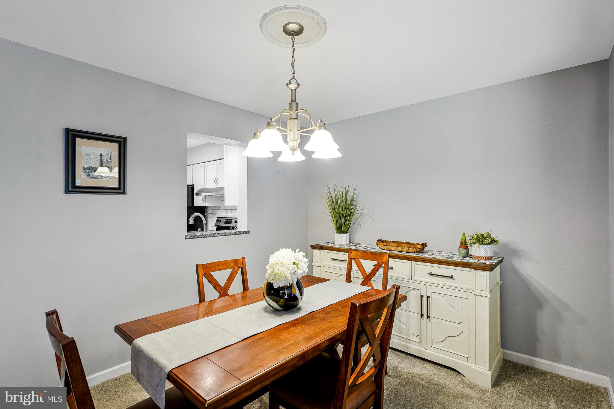 1085 Smartts Lane Northeast Leesburg, VA 20176 - Photo 12 of 38 a dining room with furniture and window