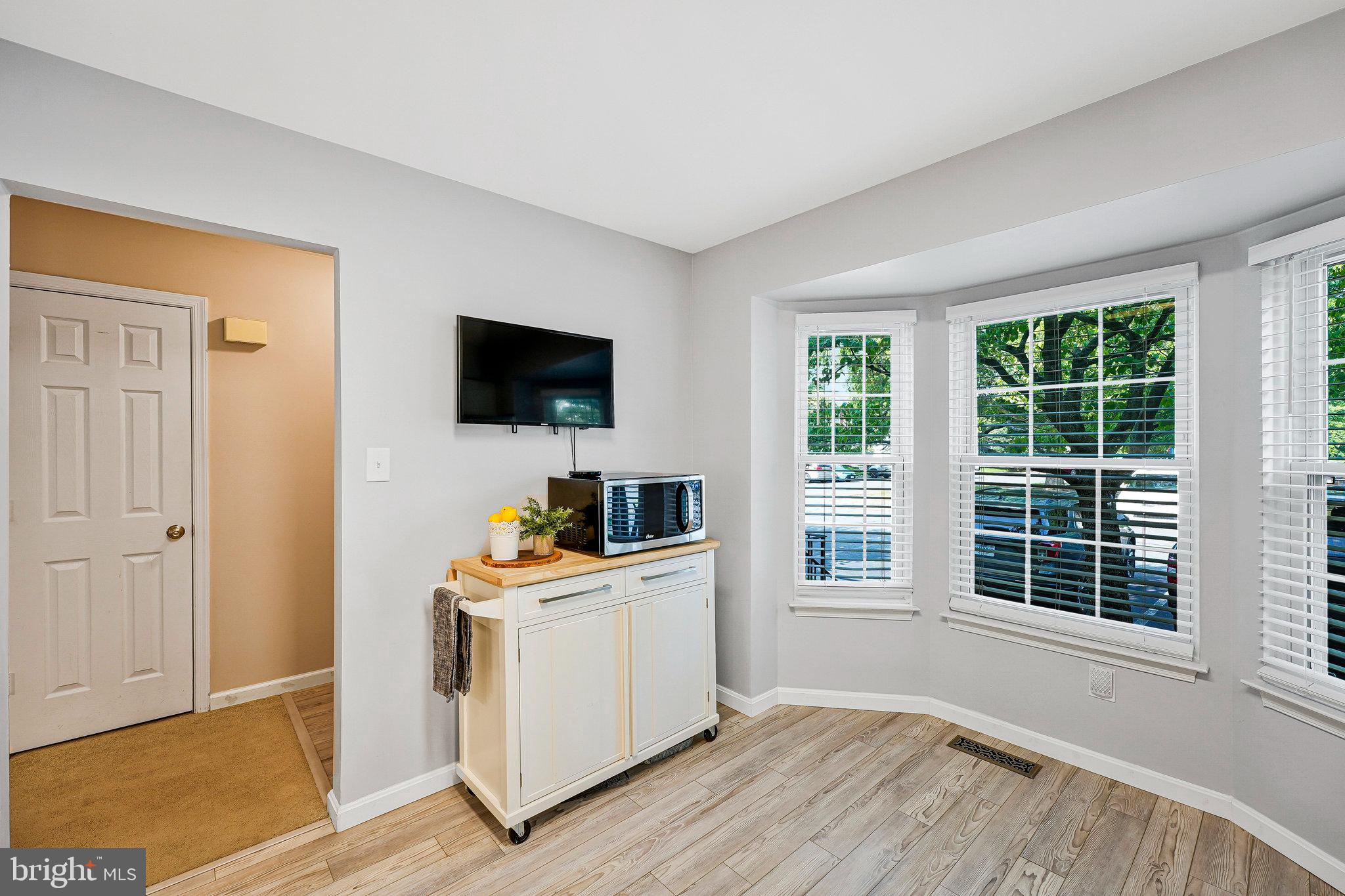 1085 Smartts Lane Northeast Leesburg, VA 20176 - Photo 8 of 38 a view of a livingroom with workspace and a window