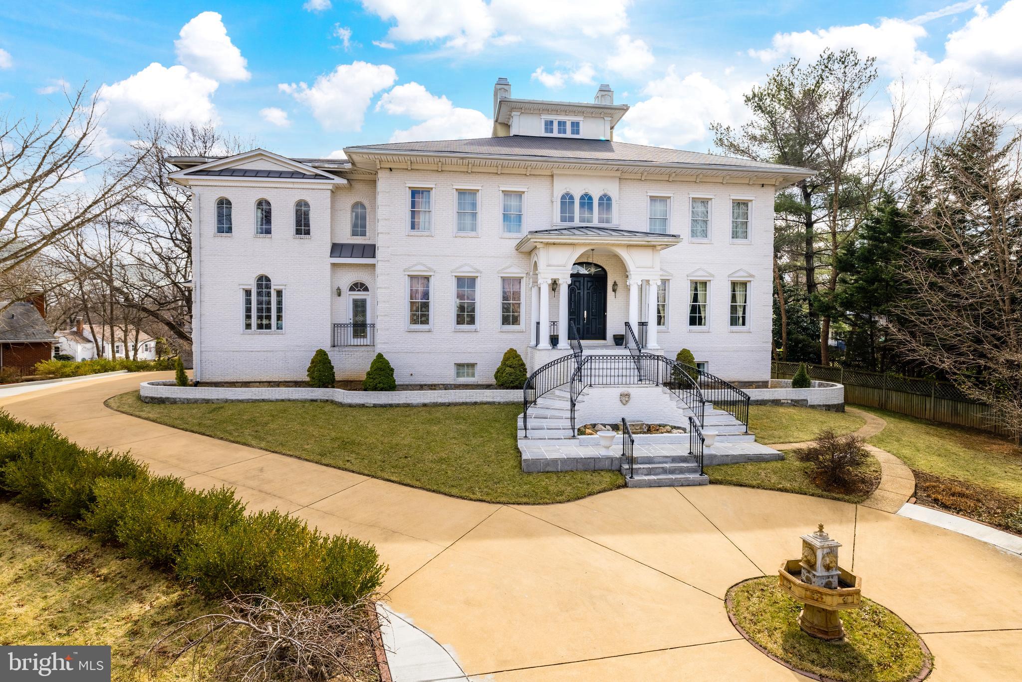 2909 Chain Bridge Road Oakton, VA 22124 - Photo 1 of 41 Elegant White-Brick Exterior