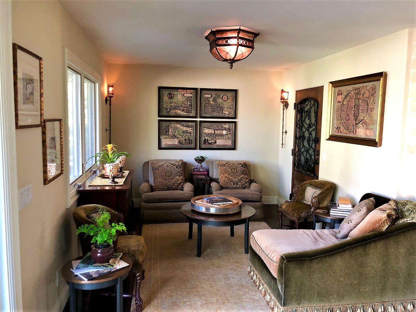 1035 Ortega Road Pebble Beach, CA 93953 - Photo 5 of 18 a living room with furniture and a potted plant