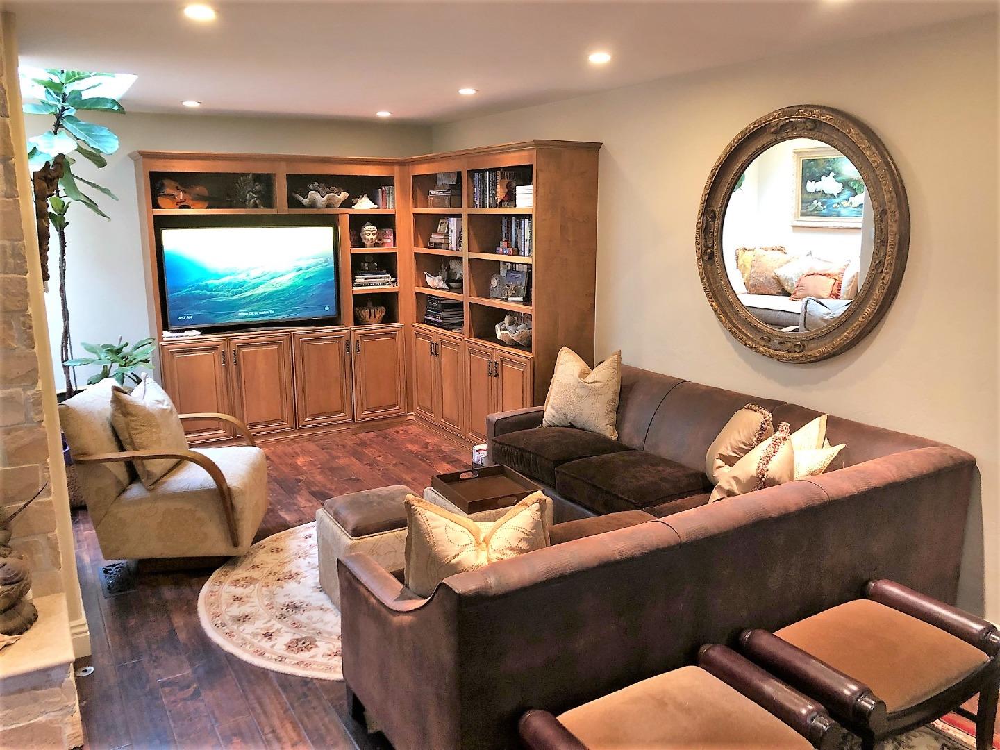 1035 Ortega Road Pebble Beach, CA 93953 - Photo 7 of 18 a living room with furniture and a flat screen tv