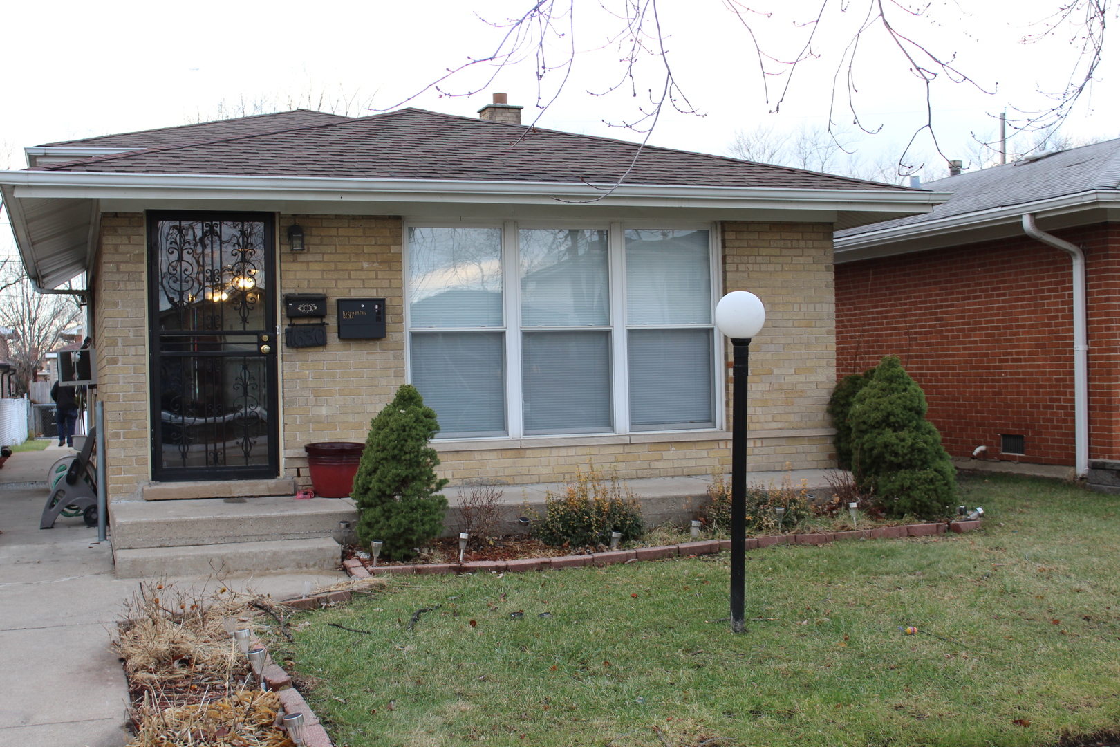 11630 South Throop Street Chicago, IL 60643 - Photo 1 of 15 a front view of a house with garden