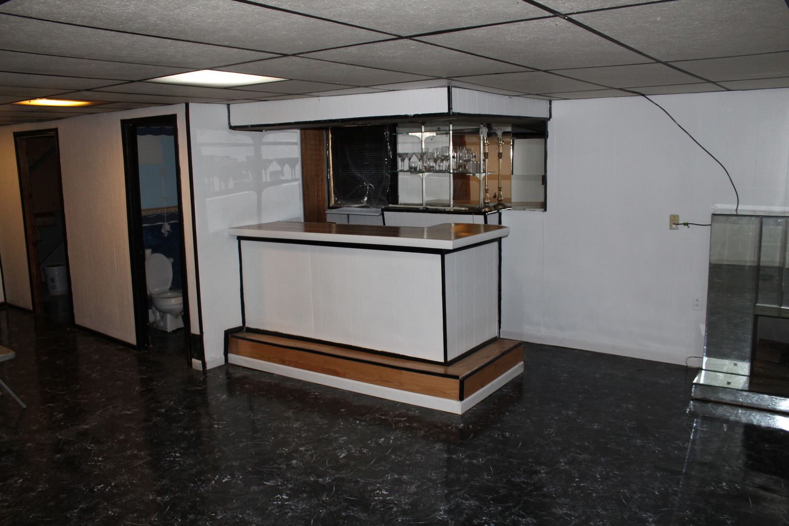11630 South Throop Street Chicago, IL 60643 - Photo 14 of 15 a living room with stainless steel appliances kitchen island furniture and wooden floor