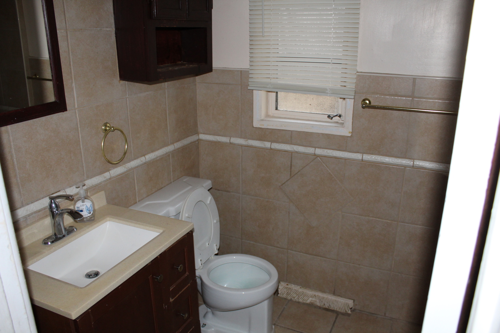 11630 South Throop Street Chicago, IL 60643 - Photo 9 of 15 a bathroom with a sink toilet and vanity